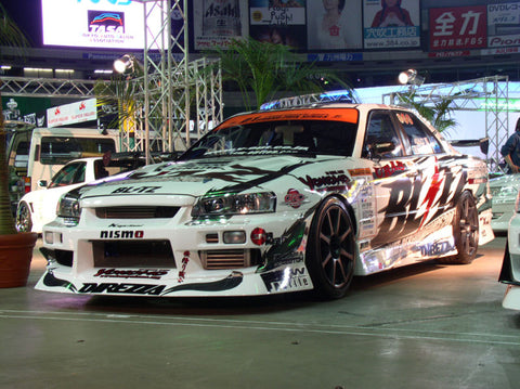 URAS Nissan Skyline R34 (ER34) Haridashi Front Bumper Canards