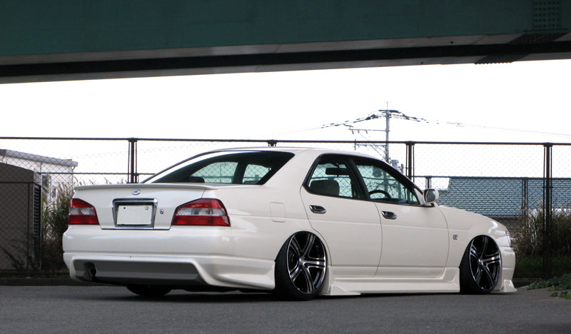 URAS Nissan Laurel (C35) Medalist Kouki Side Skirts