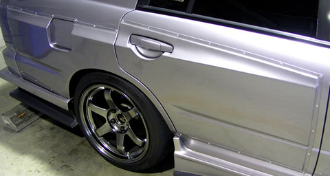 URAS Nissan Skyline R34 (ER34) D1 Spec Rear Wide Fenders (4 Door)