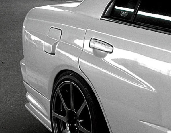 URAS Nissan Skyline R34 (ER34) Type R Fuel Lid